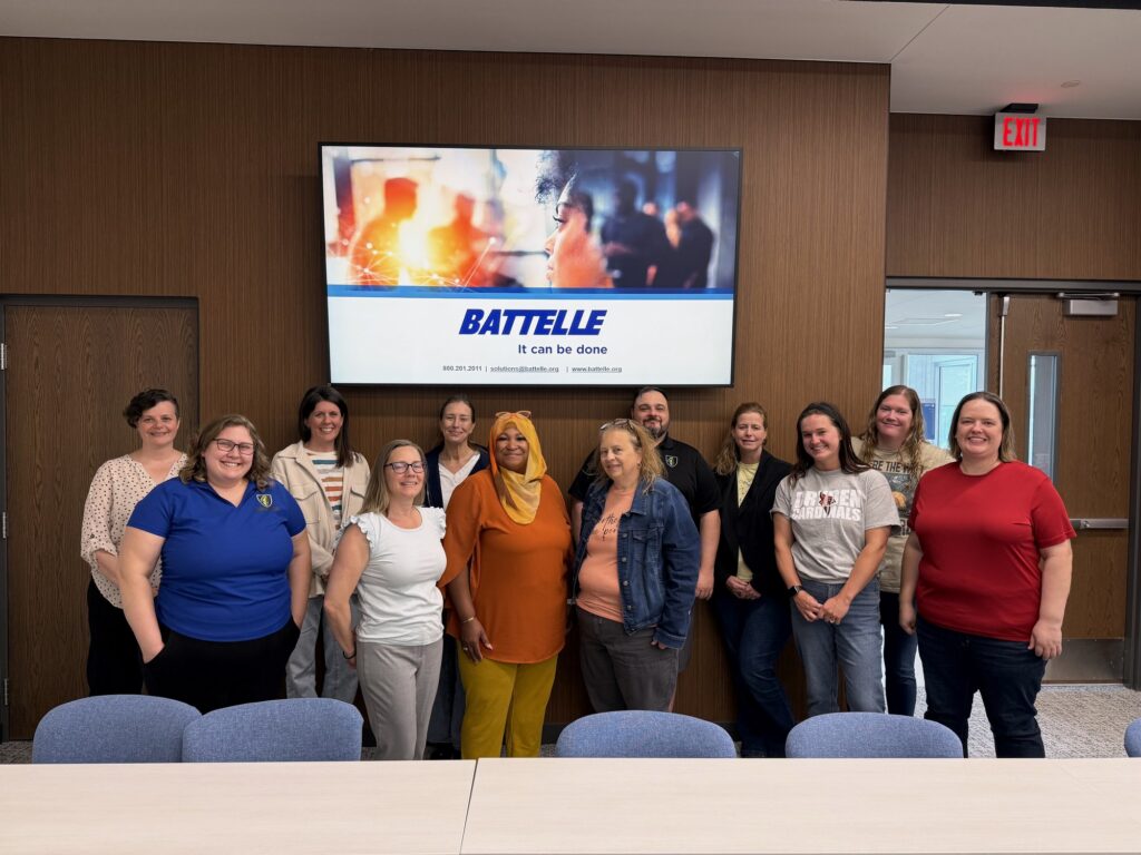 Michigan cohort teachers gather in a Battelle training room at the close of their Year 4 kickoff session.